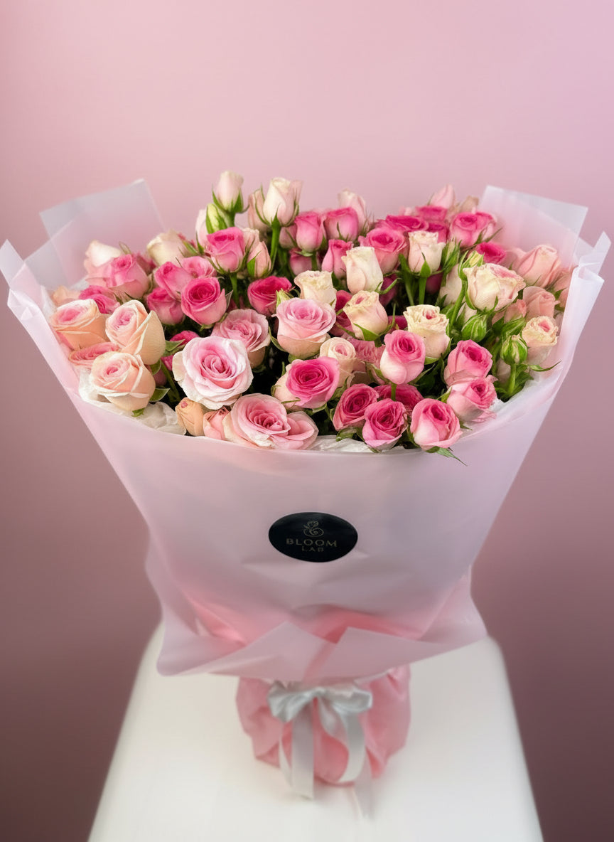 The pink Garden- 20 baby roses of pink color arranged as garden for her