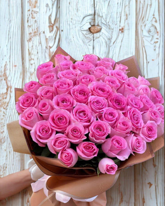 51 pink upper class roses in bloom lab premium bloom lab bag, free delivery across uae 