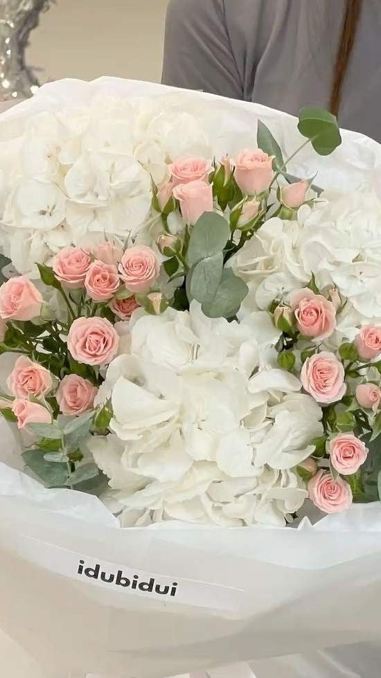 3 hydrangeas white , 7 stem of pink baby roses- Dubai flower delivery