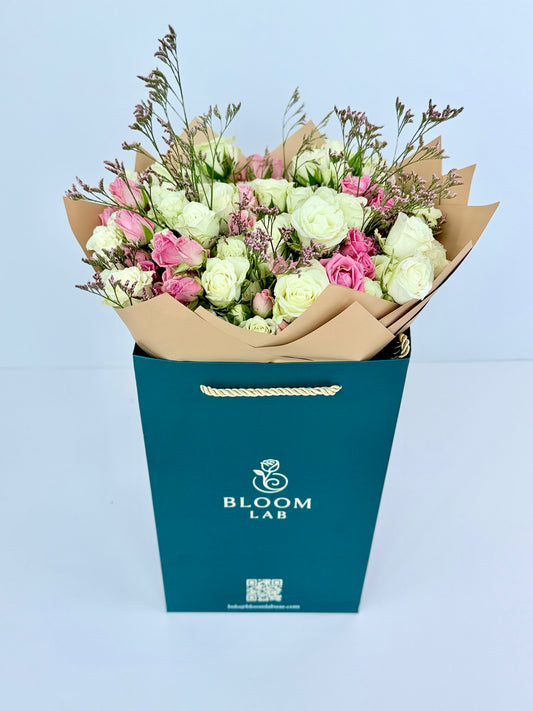 Elegant blush rose box with pink and cream roses – flower delivery in Dubai