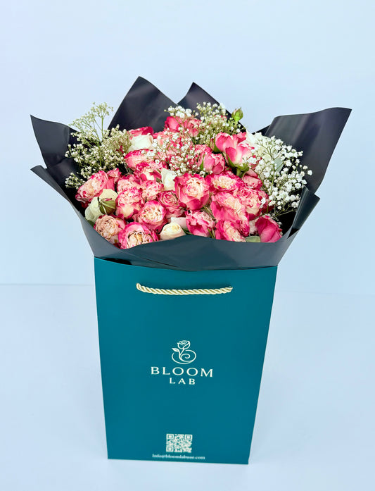 Two-tone pink roses with white roses and baby’s breath – luxury bouquet delivery in Dubai UAE

