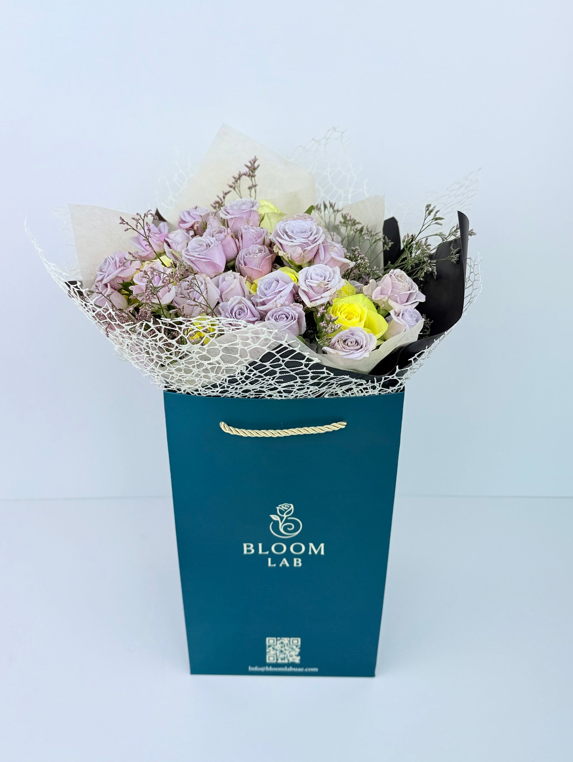 Lilac and yellow rose bouquet – fresh online flowers in Dubai with free same-day delivery by Bloom Lab UAE.