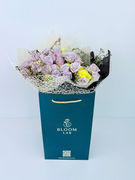 Lilac and yellow rose bouquet – fresh online flowers in Dubai with free same-day delivery by Bloom Lab UAE.