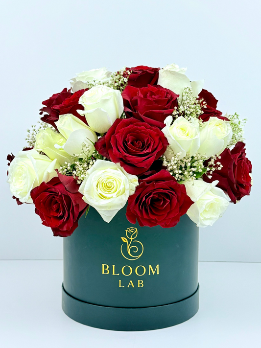 Red and white roses bloom box – fresh online flowers in Dubai with free same-day delivery by Bloom Lab UAE.
